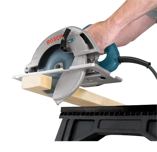 Bosch CS5 circular saw cutting a wooden plank.