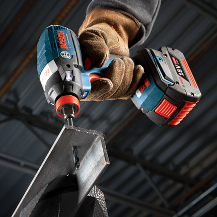 Bosch EC Motor Lithium-Ion 18V cordless drill in use, drilling into a metal beam. A person wearing work gloves holds the drill.