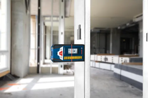 Bosch Professional L8 line laser level in use.