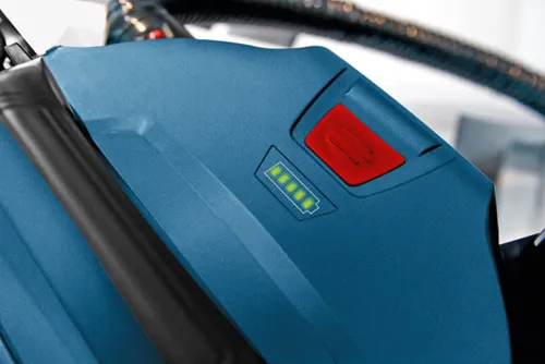 Blue and red tool component with battery level indicator.