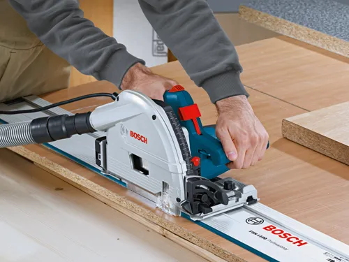 Bosch FSN 1100 Professional circular saw in use, with text "BOSCH" and "FSN 1100 Professional".