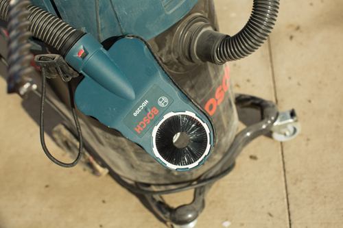 Bosch HDC200 brush tool with hose and black cord.
