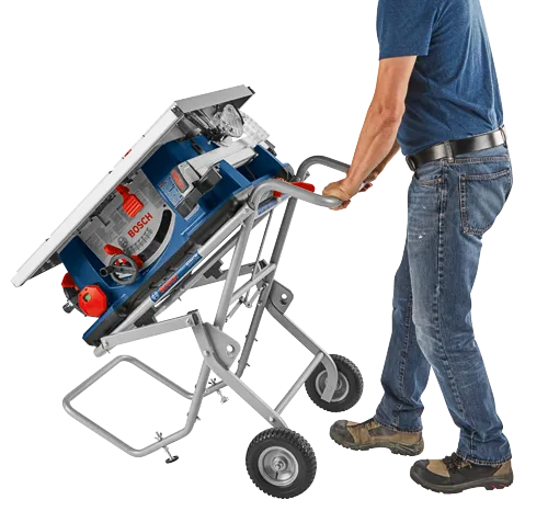 Bosch GTA47W Gravity Rise saw table with person pushing it.