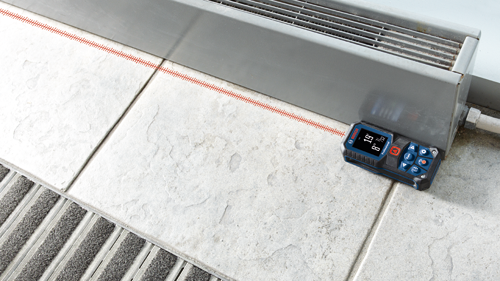 Bosch Professional distance meter, displaying "19’ 0” 7/32" with a red laser line.