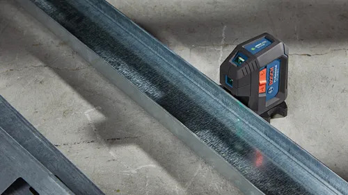 Bosch Professional GPL 100-30 G Green Laser Technology laser level, projecting a green line, on a metal channel