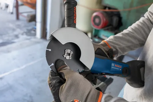 Bosch GWX18V-50PC angle grinder with "BOSCH" visible on the handle and the body.