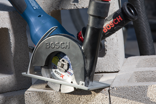 Bosch circular saw cutting concrete blocks, with 'Xtreme 5X Life' blade.