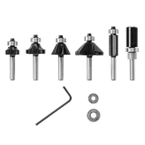 Bosch router bits, various profiles, with wrench and bearings.