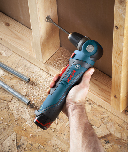 Hand holding a Bosch drill with "BOSCH" text on the drill.