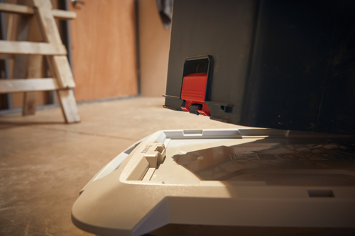 L-BOXX, tan, with the L-BOXX logo and a red locking mechanism.