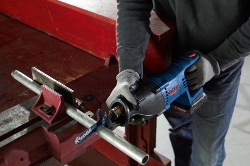 Bosch Lithium Ion reciprocating saw, cutting a metal pipe in a vise. EDGE Extreme Cut blade is visible.