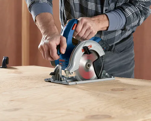 Bosch CCS180 6 1/2" circular saw in use.