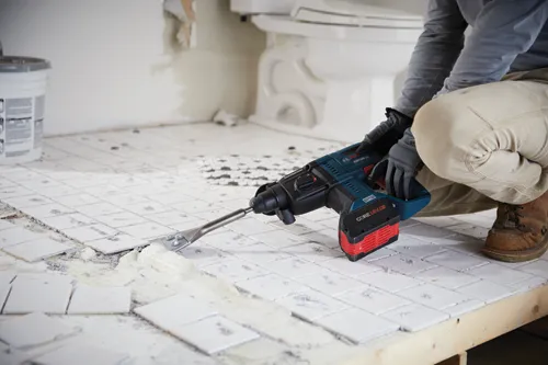 Bosch GBH18V-21 hammer drill, with CORE18V 8 battery, removing tiles.