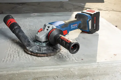 Bosch GWS18V-13C angle grinder with battery and brush attachment, and "Bosch" text on handle.
