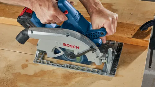 Bosch circular saw cutting wood.