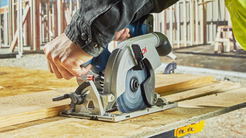 Bosch circular saw cutting wood.