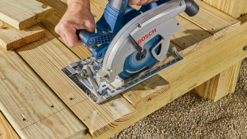 Bosch circular saw cutting wood, with "BOSCH" visible.