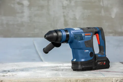 Bosch GBH18V-34CQ HD cordless rotary hammer, with "TURBO BRUSHLESS" and "AMP Share 18V 8 Ah" features.