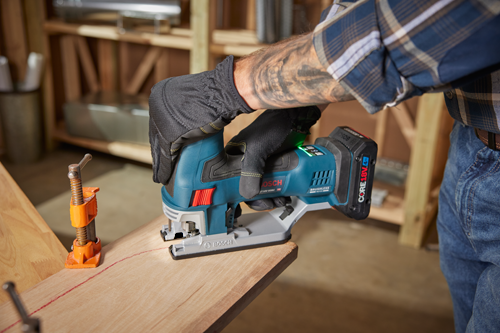 Bosch ST18V-60BC cordless jigsaw being used to cut wood.