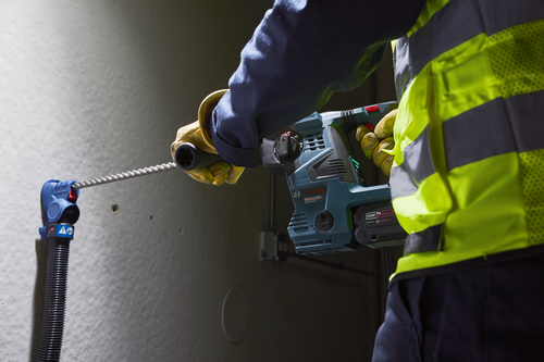 Bosch GBH18V-28C, a person wearing a reflective vest is operating the tool.