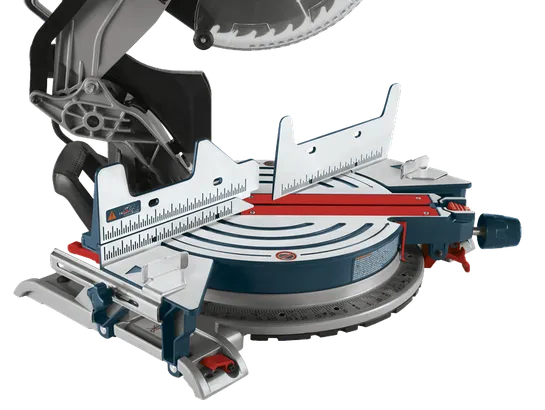 Bosch miter saw, with a red and blue design, includes measuring scales and an adjustable blade.
