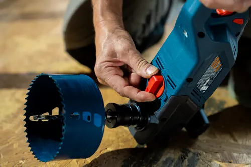Bosch cordless right angle drill GRD18V-127HX model product application image on woodworking showcase.