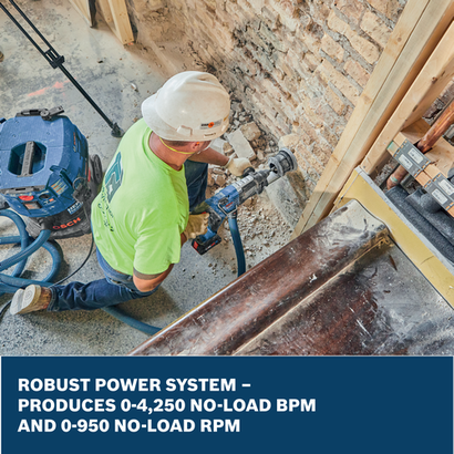 Bosch GBH18V-28DC SDS-plus® Bulldog™ Rotary Hammer connected to a vacuum drilling into an exterior brick wall.