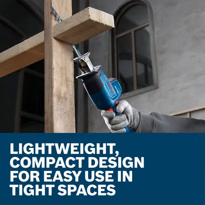 A worker using a Bosch GSA18V-24 18V Compact Reciprocating Saw to cut wood framing.