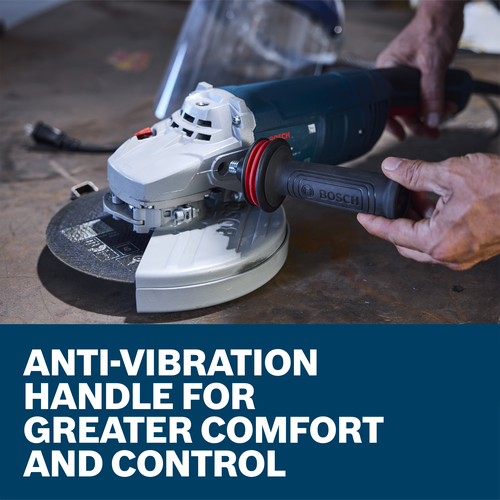 A worker is holding the Bosch GWS22-230J 9 In. Angle Grinder with one hand on the anti-vibration handle.
