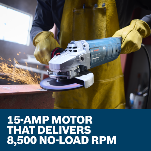 The worker using the Bosch GWS22-180J 7 In. Large Angle Grinder to grind the edge of a piece of metal in a work shop.