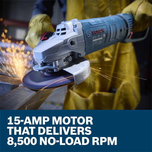 The worker using the Bosch GWS25-180PR 7 In. Large Angle Grinder to grind the edge of a piece of metal in a work shop.