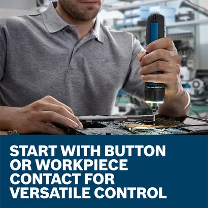 The worker using the Bosch GSD4V-35 4V Max Rechargeable Screwdriver working on a computer board.
