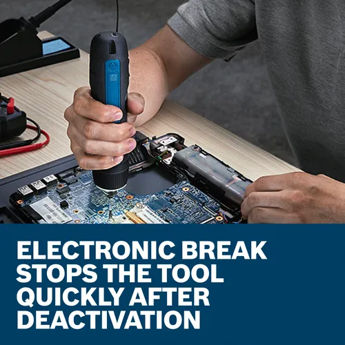 The worker using the Bosch GSD4V-35 4V Max Rechargeable Screwdriver to work on a computer board.