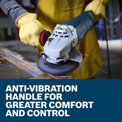 The worker using the Bosch GWS25-180JR 7 In. Large Angle Grinder to grind the edge of a piece of metal in a work shop.