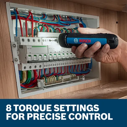 The worker using the Bosch GSD4V-35 4V Max Rechargeable Screwdriver to get into an electrical panel.