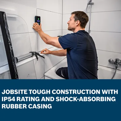 The working using the Bosch GMS120-27 Wall Scanner on the wall of a bathroom.