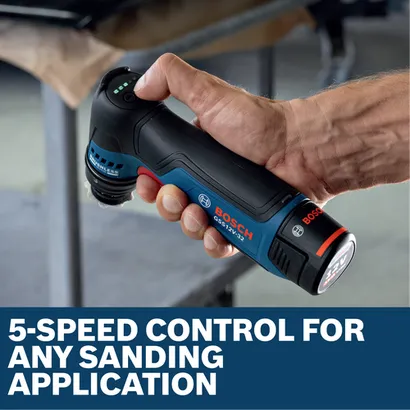 Image of worker speeding up the Bosch GSS12V-32N 12V Compact 1-1/4 In Orbital Sander for finishing a car.