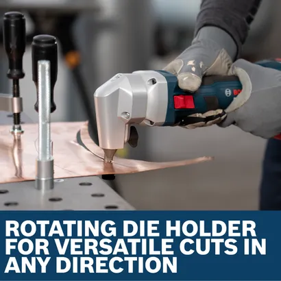 Image of worker using the Bosch GNA18V-16EN 18V 16-Gauge Nibbler to cut a copper plate.