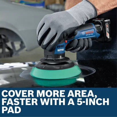 Image of worker using the Bosch GPX12V-125N 12V 5 In. Random Orbital Polisher for finishing the car.