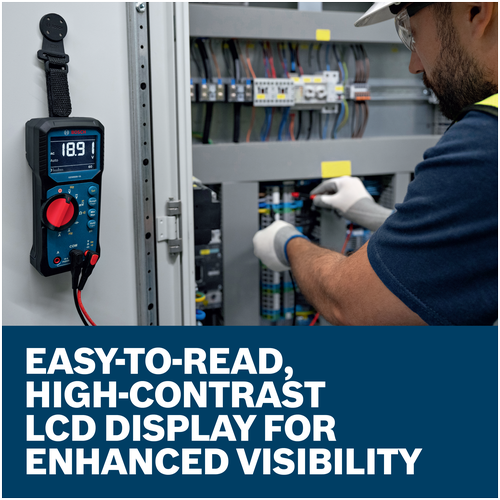 A technician using a Bosch GDM600-15 True RMS Digital Multimeter hung on an electrical panel.