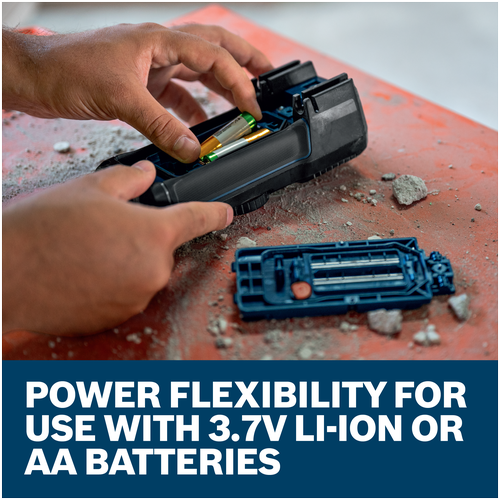 Hands inserting batteries into Bosch GDM600-15 True RMS multimeter; supports 3.7V Li‑Ion or AA batteries.