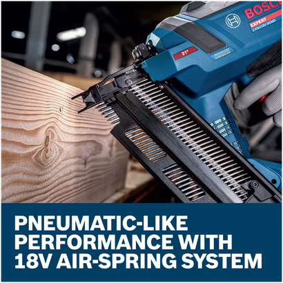 A worker using a Bosch EXNH18V-90MRN EXPERT Framing Nailer driving nails into a wooden board.