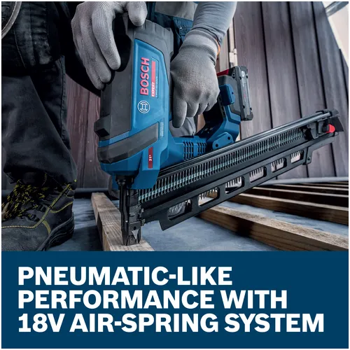 A worker using a Bosch EXNH18V-90MRB14 Expert Framing Nailer to drive nails into a wooden board.