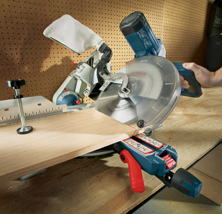 Bosch circular saw blade on GCM12SD cutting wood.