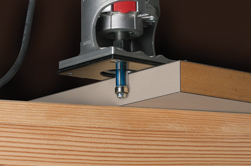 Bosch router cutting into wood.