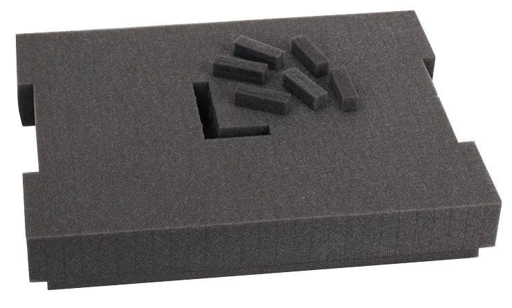 Dark gray foam insert with cutouts and small rectangular foam pieces.