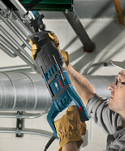 Bosch RS428 reciprocating saw being used to cut a pipe