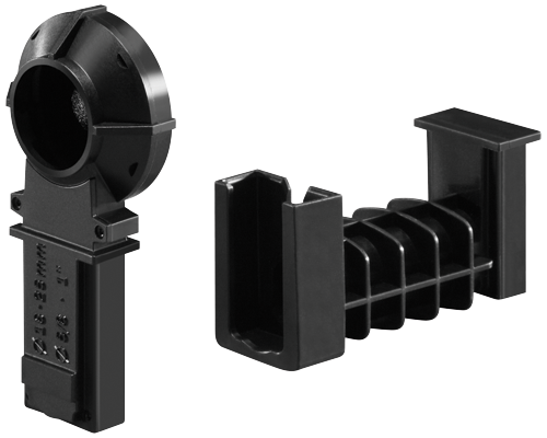 Objets en plastique noir avec texte visible : 32-35 mm, 1", 5/8".