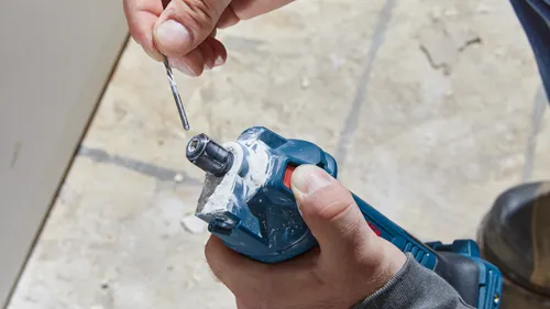 Core 18V-GCU18V-30N Cordless Drywall Cutout tool in use on drywall, with model.