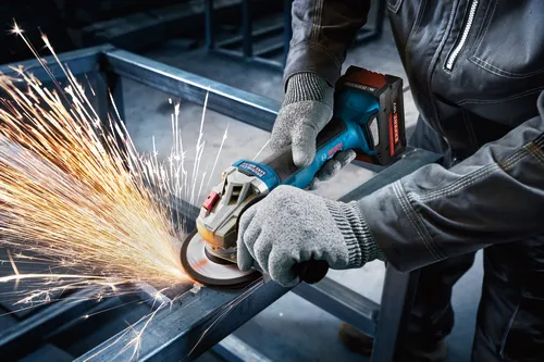 Worker using the Bosch GWX18V-8-2N 18V X-LOCK 4-1/2 In. Angle Grinder for cutting a steel plate.
